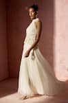 Shop Nitika Gujral Ivory Chiffon, Satin, Organza Pearls, Fringe Halter Pleated Skirt And Blouse Set Online at Aza Fashions Shop_Nitika Gujral_Ivory Chiffon, Satin, Organza Pearls, Fringe Halter Pleated Skirt And Blouse Set _Online_at_Aza_Fashions