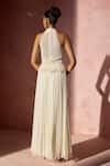 Nitika Gujral Ivory Chiffon, Satin, Organza Pearls, Fringe Halter Pleated Skirt And Blouse Set Online at Aza Fashions Nitika Gujral_Ivory Chiffon, Satin, Organza Pearls, Fringe Halter Pleated Skirt And Blouse Set _Online_at_Aza_Fashions