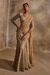 Buy Nitika Gujral Gold Net, Satin Beads, Sequins, Crystals, Pre-draped Lehenga Saree With Blouse at Aza Fashions Buy_Nitika Gujral_Gold Net, Satin Beads, Sequins, Crystals, Pre-draped Lehenga Saree With Blouse _at_Aza_Fashions