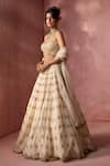 Shop Nitika Gujral Cream Organza, Satin Embroidery, Sequins, Stones, Crystals, Beads, Lehenga Set Online at Aza Fashions Shop_Nitika Gujral_Cream Organza, Satin Embroidery, Sequins, Stones, Crystals, Beads, Lehenga Set _Online_at_Aza_Fashions