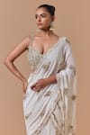 Buy Nitika Gujral Cream Shantoon, Satin, Net Embroidery, Shimmer Pre-draped Saree With Blouse Online at Aza Fashions Buy_Nitika Gujral_Cream Shantoon, Satin, Net Embroidery, Shimmer Pre-draped Saree With Blouse _Online_at_Aza_Fashions