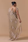 Shop Nitika Gujral Beige Chiffon, Satin, Shantoon Embroidery, Floral Pattern Saree With Blouse at Aza Fashions Shop_Nitika Gujral_Beige Chiffon, Satin, Shantoon Embroidery, Floral Pattern Saree With Blouse _at_Aza_Fashions
