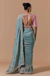 Shop Nitika Gujral Aqua Tissue, Brocade, Shantoon Sequins, Scallop Border Saree With Blouse at Aza Fashions Shop_Nitika Gujral_Aqua Tissue, Brocade, Shantoon Sequins, Scallop Border Saree With Blouse _at_Aza_Fashions