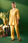 Buy Samyukta Singhania Mustard Silk Embroidery, Mirrors V-neck Hand Tunic And Pant Set at Aza Fashions Buy_Samyukta Singhania_Mustard Silk Embroidery, Mirrors V-neck Hand Tunic And Pant Set _at_Aza_Fashions