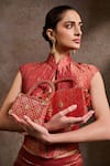 Shop Tarun Tahiliani Red Beads, Stones, Tassels Beaded Handle Brocade Clutch Bag Online at Aza Fashions Shop_Tarun Tahiliani_Red Beads, Stones, Tassels Beaded Handle Brocade Clutch Bag _Online_at_Aza_Fashions
