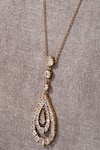 Shop Tarun Tahiliani Gold Plated Embellished Pear Pendant Drop Lariat Necklace Online at Aza Fashions Shop_Tarun Tahiliani_Gold Plated Embellished Pear Pendant Drop Lariat Necklace _Online_at_Aza_Fashions