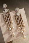 Shop Tarun Tahiliani Gold Plated Stones, Pearls, Crystals Sleek Pave Shaped Embellished Long Earrings at Aza Fashions Shop_Tarun Tahiliani_Gold Plated Stones, Pearls, Crystals Sleek Pave Shaped Embellished Long Earrings _at_Aza_Fashions