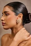 Buy Tarun Tahiliani Gold Plated Pearls, Stones, Crystals Handcrafted Embellished Stud Earrings at Aza Fashions Buy_Tarun Tahiliani_Gold Plated Pearls, Stones, Crystals Handcrafted Embellished Stud Earrings _at_Aza_Fashions