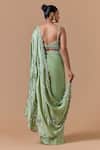Shop Nitika Gujral Green Satin, Net, Shantoon Applique, Beads, Jade Pre-draped Saree With Blouse at Aza Fashions Shop_Nitika Gujral_Green Satin, Net, Shantoon Applique, Beads, Jade Pre-draped Saree With Blouse _at_Aza_Fashions