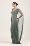 Bling Empire_Emerald Green Mesh, Lycra Beads Sweetheart Solstice Cape Sleeve Embroidered Gown _Online_at_Aza_Fashions