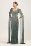 Shop_Bling Empire_Emerald Green Mesh, Lycra Beads Sweetheart Solstice Cape Sleeve Embroidered Gown _at_Aza_Fashions