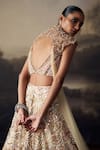 Ohaila Khan_Gold Tulle, Silk Pearls, Crystals, Sequins, Beads, Lehenga And Blouse Set _at_Aza_Fashions