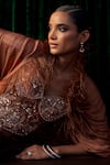 Ohaila Khan Gold Silk, Tulle Feathers, Sequins, Crystals, Corset With Pre-draped Saree at Aza Fashions Ohaila Khan_Gold Silk, Tulle Feathers, Sequins, Crystals, Corset With Pre-draped Saree _at_Aza_Fashions