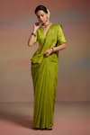 Dressfolk_Green Tissue Beads, Tassels Kira Saree With Unstitched Blouse Piece _Online_at_Aza_Fashions