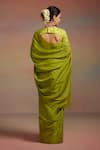 Shop_Dressfolk_Green Tissue Beads, Tassels Kira Saree With Unstitched Blouse Piece _at_Aza_Fashions
