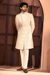 Shop Arihant Rai Sinha Cream Silk, Dupion Embroidery Paisley Sherwani Set at Aza Fashions Shop_Arihant Rai Sinha_Cream Silk, Dupion Embroidery Paisley Sherwani Set _at_Aza_Fashions