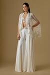Buy Asaga Ivory Satin, Tulle Beads, Sequins Seanna Abstract Embroidered Cape Sharara Set at Aza Fashions Buy_Asaga_Ivory Satin, Tulle Beads, Sequins Seanna Abstract Embroidered Cape Sharara Set _at_Aza_Fashions