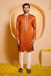 Buy Shreyansh Designs Orange Silk Embroidery, Mirrors Ojas Hand Kurta Set at Aza Fashions Buy_Shreyansh Designs_Orange Silk Embroidery, Mirrors Ojas Hand Kurta Set _at_Aza_Fashions