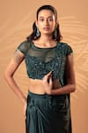 Shop_Jiya by Veer Design Studio_Emerald Green Satin Sequins, Beads, Fringe Boat Teal Draped Skirt And Blouse Set _Online_at_Aza_Fashions