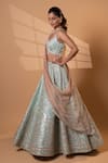 Shop_Jiya by Veer Design Studio_Green Silk, Net Sequins, Beads, Embroidery Sweetheart Neck Lehenga Set _at_Aza_Fashions