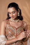 Jiya by Veer Design Studio_Rust Net Embroidery, Sequins, Beads Sweetheart Neck Blouse Lehenga Set _at_Aza_Fashions