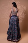 Shop_Jiya by Veer Design Studio_Blue Embroidery, Mirrors, Tassels V-neck Midnight Bloom Lehenga Set _at_Aza_Fashions