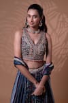 Shop_Jiya by Veer Design Studio_Blue Embroidery, Mirrors, Tassels V-neck Midnight Bloom Lehenga Set _Online_at_Aza_Fashions