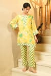 Buy_Surabhi Arya_Yellow Muslin Piping, Pom-poms V-neck Floral Print And Pant Set _at_Aza_Fashions