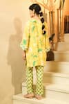 Shop_Surabhi Arya_Yellow Muslin Piping, Pom-poms V-neck Floral Print And Pant Set _at_Aza_Fashions