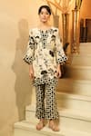 Surabhi Arya_Ivory Crepe Split V-neck Botanical Print Kurta And Polka-dot Pant Set _at_Aza_Fashions