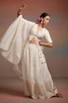 Buy_Dressfolk_Ivory Silk Zari, Sequins, Embroidery, Beads Triptika Woven Kurta Lehenga Set _Online_at_Aza_Fashions
