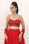 Omal Sindwani_Red Satin, Net Beads, Sequins, Tassels Sweetheart Neck Scarlet Flame Lehenga Set _at_Aza_Fashions