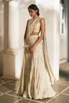 Shop_Paulmi And Harsh_Ivory Georgette, Satin Embroidery, Sequins, Tiered Pre-draped Saree With Blouse _Online_at_Aza_Fashions
