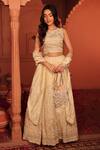 Tasuvure Indes_Ivory Georgette, Chiffon Sequins, Beads, Inaaya Cutdana Embroidered Lehenga Set _Online_at_Aza_Fashions