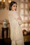Buy_Seema Gujral_Cream Net Sequins, Pearls, Embroidery, Tassels Open Neck, Jacket Sharara Set _Online_at_Aza_Fashions