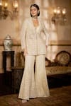 Buy_Seema Gujral_Cream Net Sequins, Pearls, Embroidery, Tassels Open Neck, Jacket Sharara Set _at_Aza_Fashions