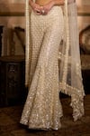Buy_Seema Gujral_Cream Net Sequins, Pearls, Tassels, Fringe Sweetheart Embroidered Sharara Set _Online_at_Aza_Fashions