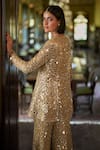 Seema Gujral_Gold Net Mirrors, Embroidery, Tassels Plunge Neck Work Jacket Sharara Set _Online_at_Aza_Fashions
