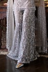 Seema Gujral_Silver Net Sequins, Crystals, Tassels Scoop Neck Embroidered Sharara Set _at_Aza_Fashions