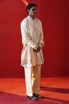 Shop_AUGUST by Swati Akash Jhunjhunwala_Beige Satin, Linen Embroidery, Mirrors Kurta Pant Set _at_Aza_Fashions