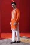 Shop_AUGUST by Swati Akash Jhunjhunwala_Orange Satin, Linen Applique, Embroidery Leather Kurta Set _at_Aza_Fashions