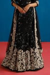 Mishru_Black Tulle Sequins, Embroidery Sweetheart Maryse Embellished Corset Lehenga Set _at_Aza_Fashions