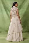 Shop_Awigna_Ivory Organza, Net Embroidery, Beads, Ruffles Lumieire Jacket Skirt Set _at_Aza_Fashions