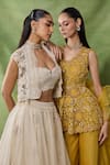 Awigna_Ivory Organza, Net Embroidery, Beads, Ruffles Lumieire Jacket Skirt Set _at_Aza_Fashions