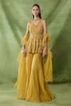 Buy_Awigna_Yellow Organza, Net Embroidery, Sequins, Zari, Lasair Peplum Top Sharara Set _at_Aza_Fashions