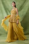 Buy_Awigna_Yellow Organza, Net Embroidery, Sequins, Zari, Lasair Peplum Top Sharara Set _Online_at_Aza_Fashions