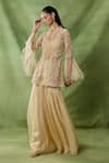 Buy_Awigna_Gold Organza, Net Embroidery, Sequins V-neck, Dia Peplum Top Sharara Set _at_Aza_Fashions