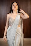 Buy_Rirasa_Silver Crepe Sequins, Azza Cutdana Embroidered Corset With Pre-draped Saree 