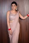 Buy_Ritika Verma_Pink Lycra Sequins, Stones Nadia Embellished Pre-draped Saree With Blouse _at_Aza_Fashions
