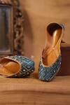 Shop_Kurrbat_Blue Neelam Hand Embroidered Mirror Work Juttis _at_Aza_Fashions